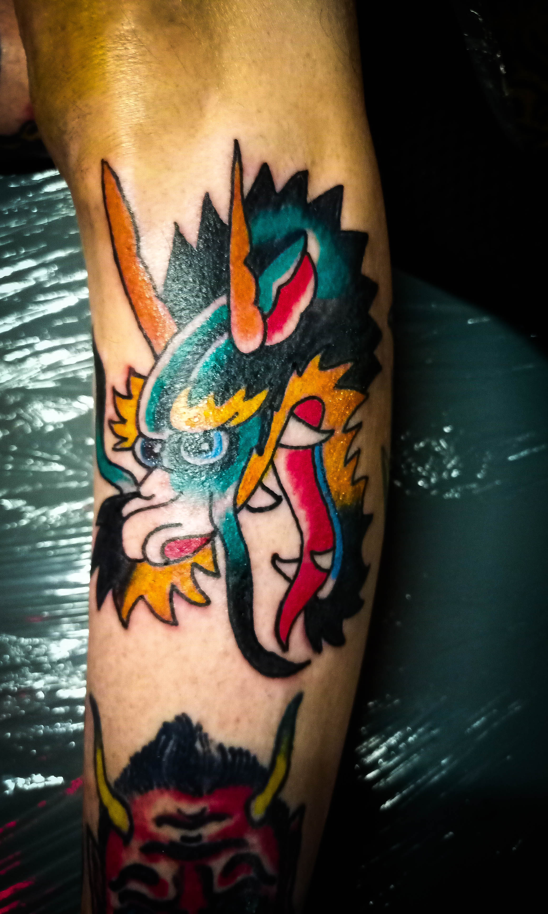 Traditional dragon tattoo piece by Camelot Rose